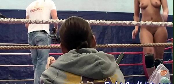  Athletic lesbians wrestling in a boxing ring